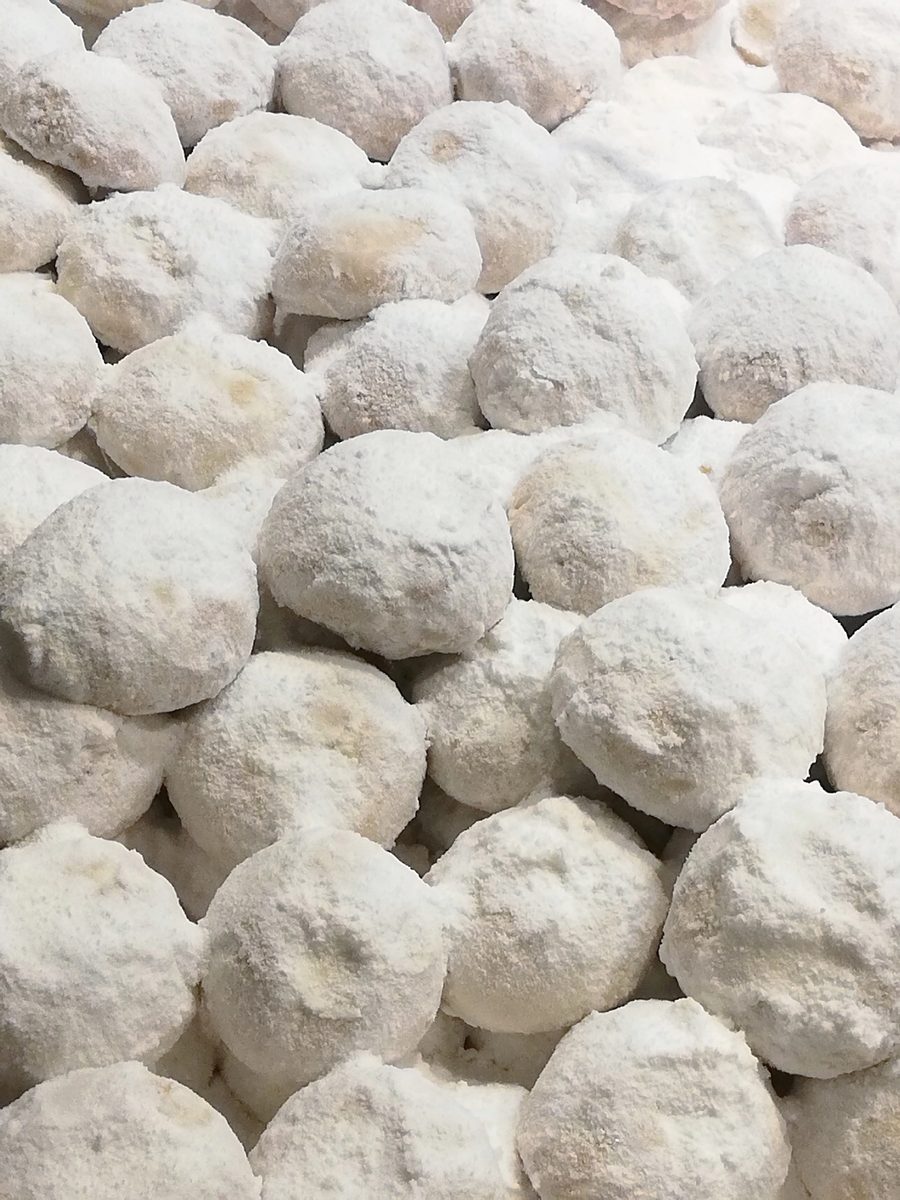 Kourabiedes almond cookies covered in powdered sugar