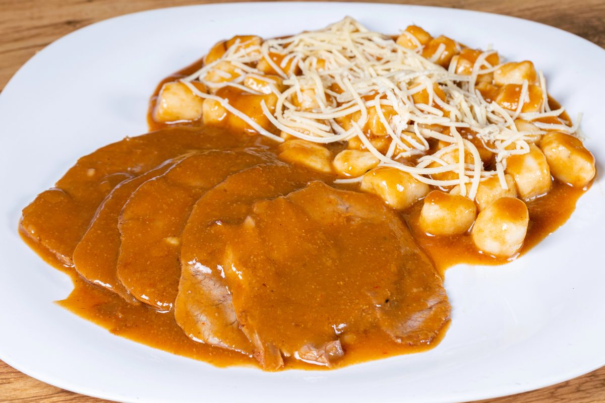 Pašticada, braised beef in a rich wine sauce, served with gnocchi
