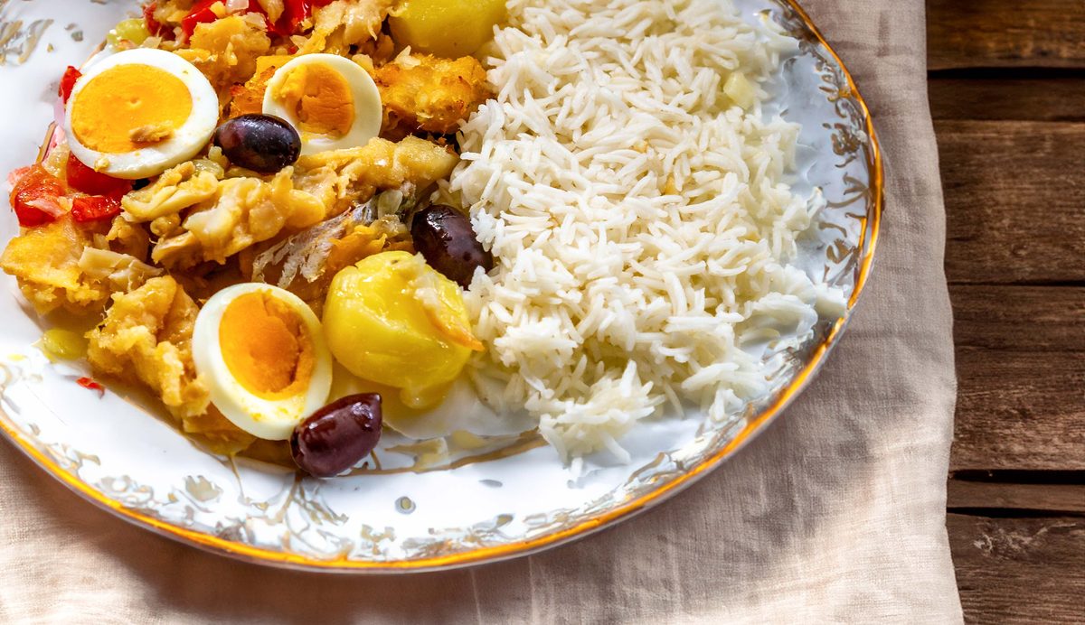 Boiled salt cod with eggs, olives and rice, a Portuguese Christmas Eve dish