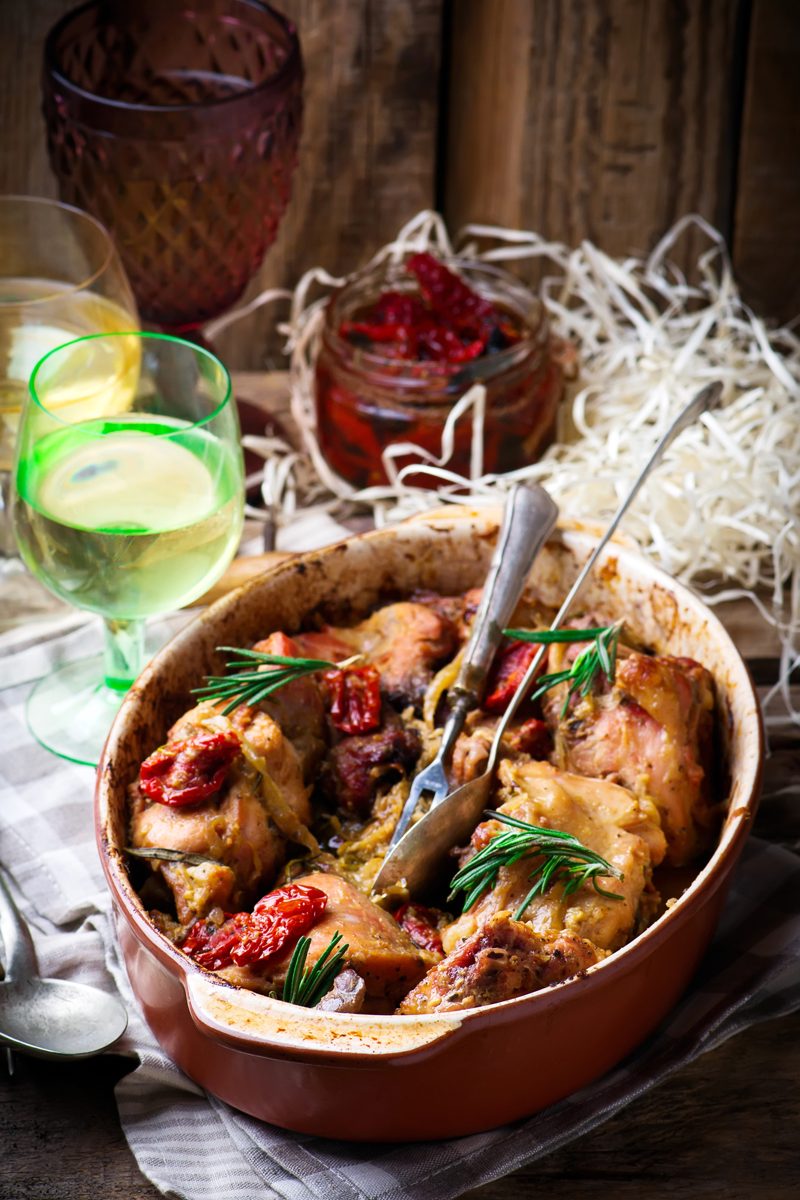 Braised rabbit with vegetables in a ceramic dish