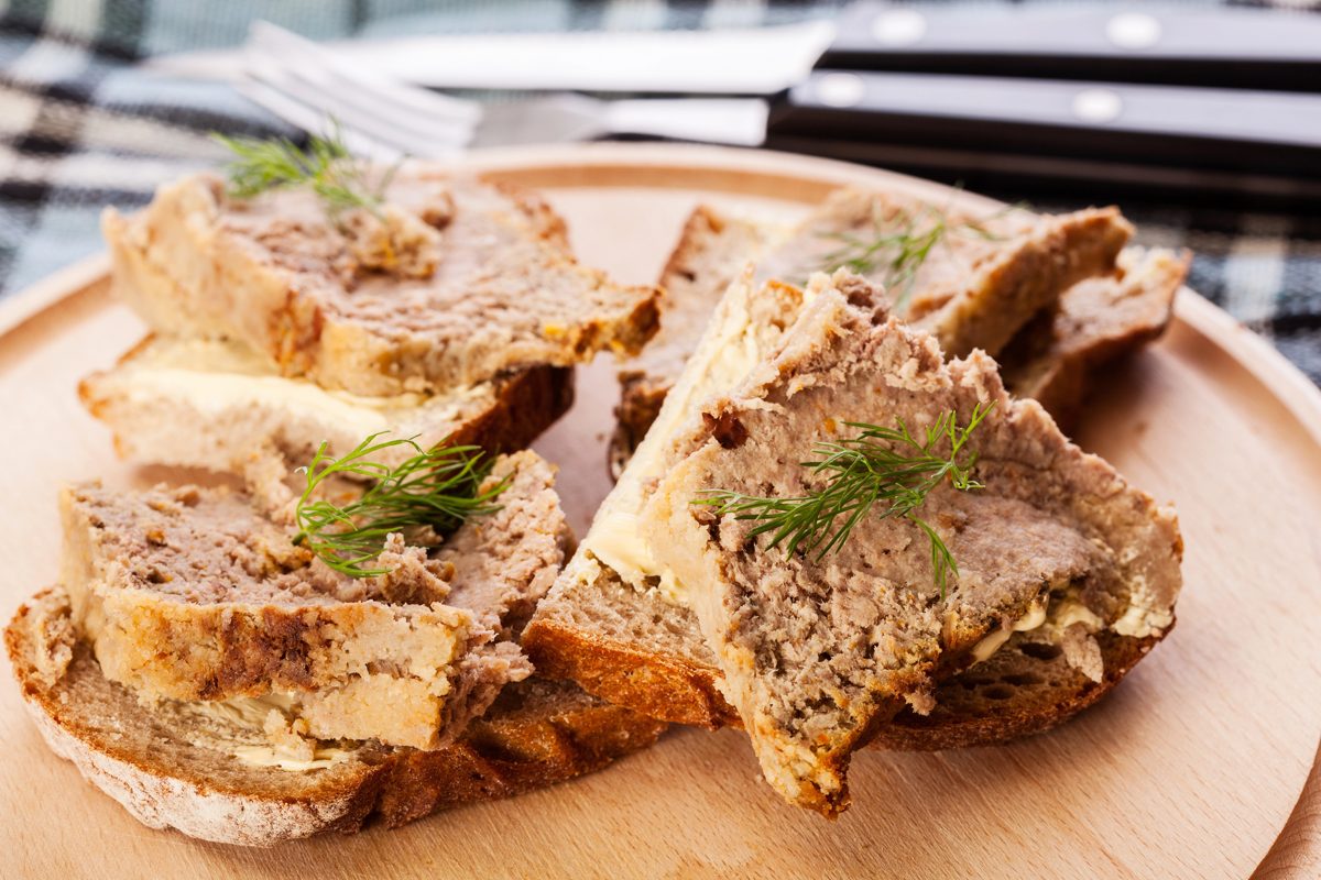 Slices of baked meat pâté on bread