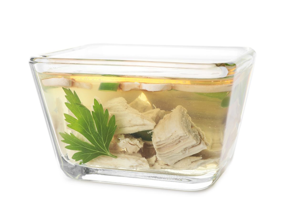 Meat aspic with parsley in a glass dish