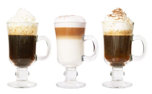 Three glasses of Irish coffee topped with cream