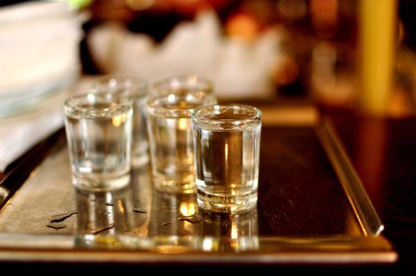 Small glasses of plum brandy on a tray