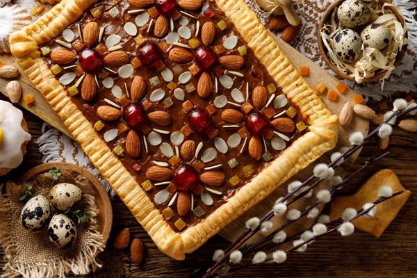 Mazurek Easter tart decorated with nuts and dried fruit