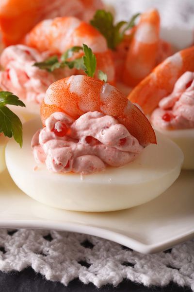 Egg halves topped with shrimp and roe