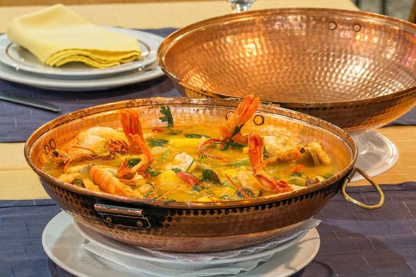 Seafood cataplana in a copper pan