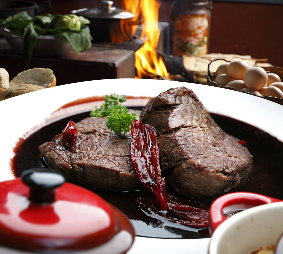 Beef fillet with red wine sauce on a plate